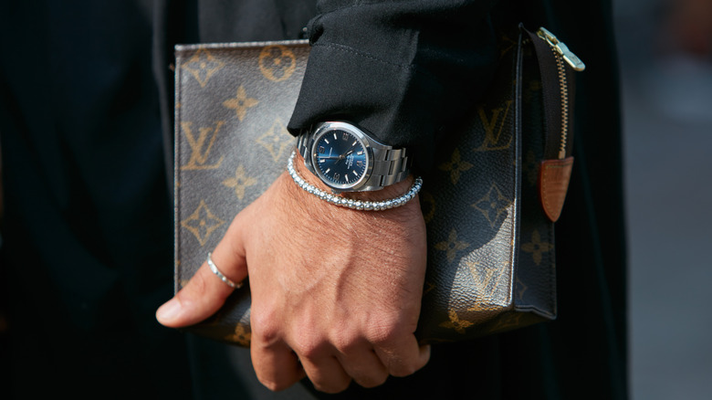 A man wearing a Rolex Air-King